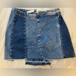 Denim skirt. “Re-done” denim
